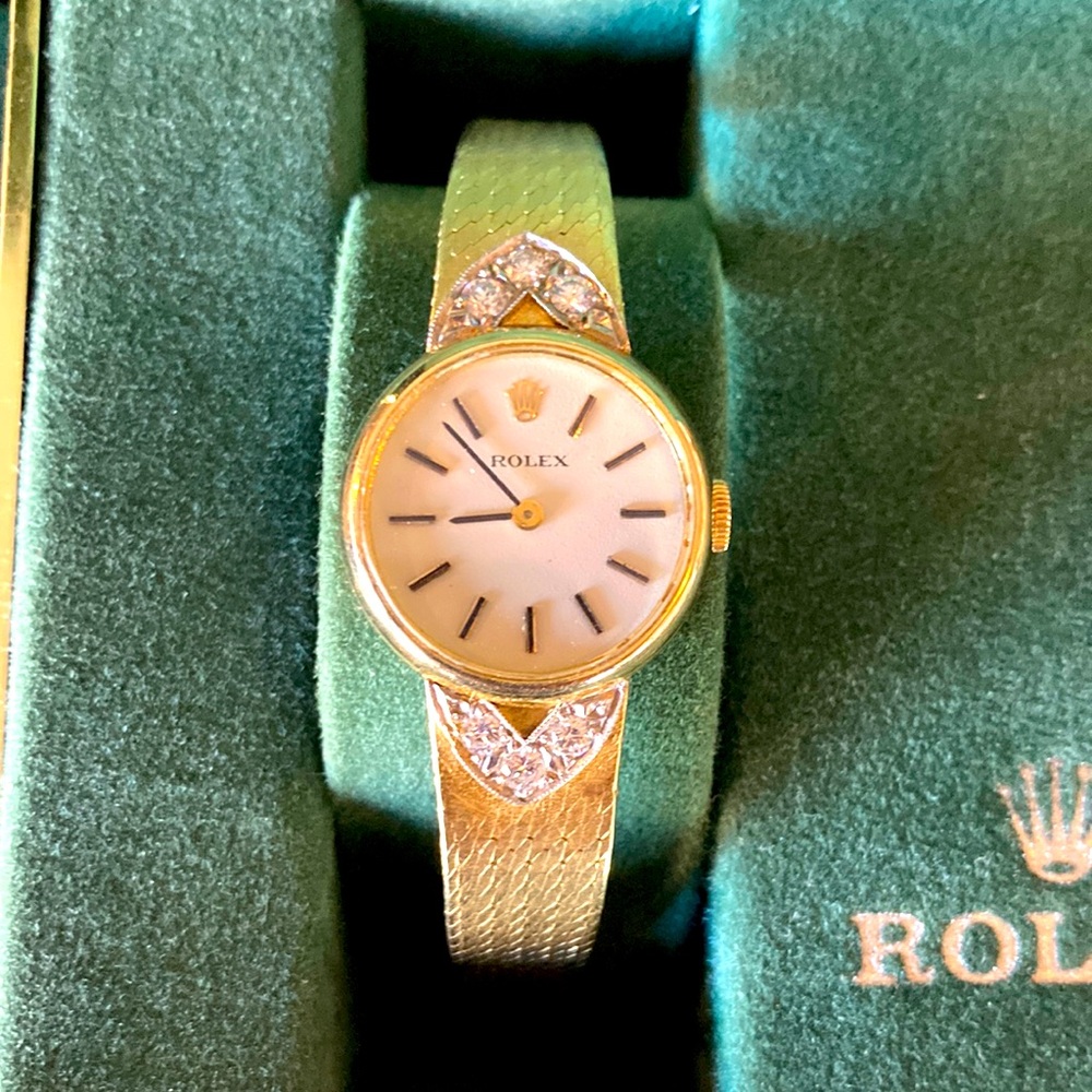 Rolex 14kt gold watch with diamonds